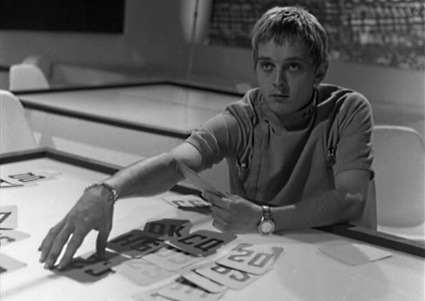 David Hemming sits at a futuristic desk