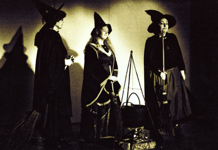 Three witches with cauldron