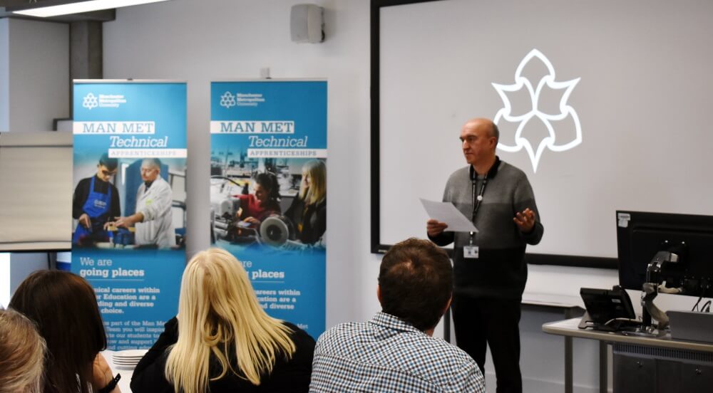 Gareth addressing classroom