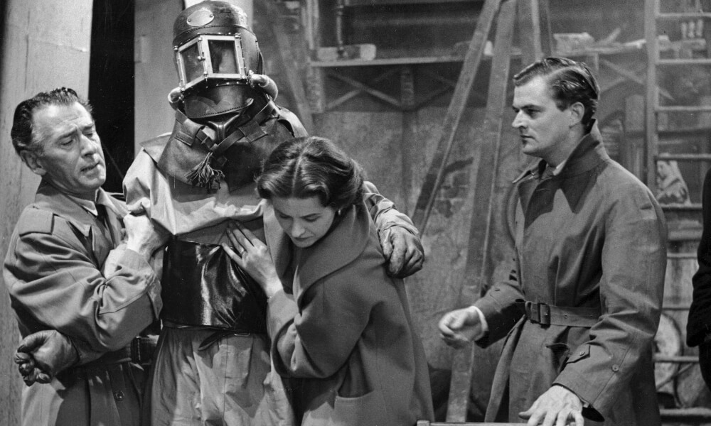 Injured spaceman with helpers
